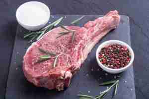 Cowboy Steak seasoned with thyme, salt, pepper